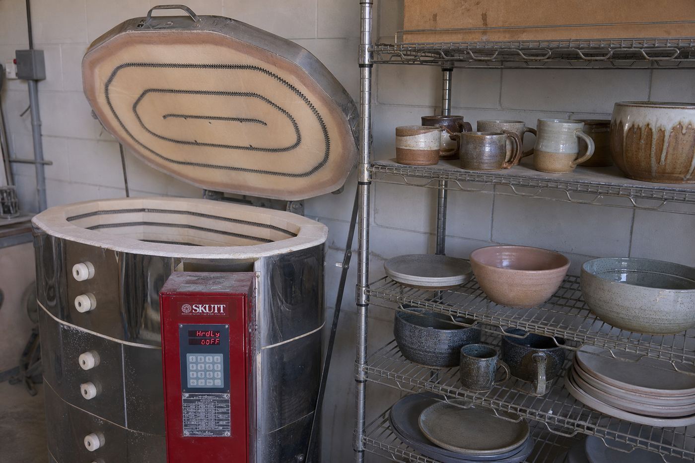 Kiln shelves with pottery